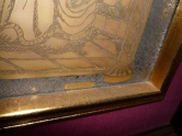 Picture on carved glass plate decorated with gold 
