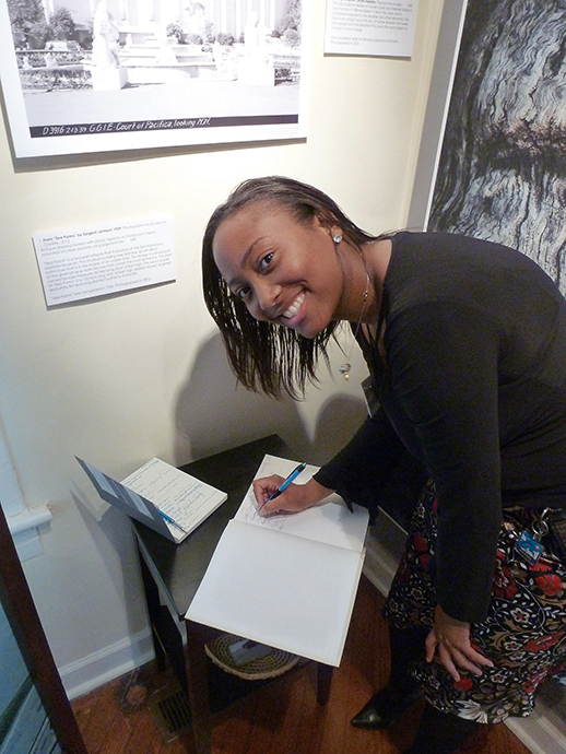 VUL Student Signs Guest Book