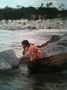 Mila Kronik's The little girl is worshiping Ganga river.